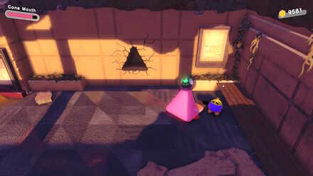 Kirby - Fit through the triangle-shaped hole using the Cone Mouth