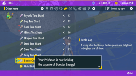 Pokemon Scarlet and Violet (SV) - Iron Hands being given a Booster Energy