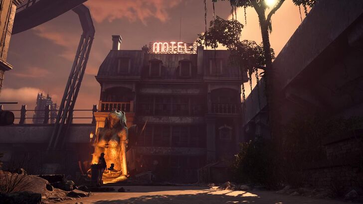 Motel and Siren Statue