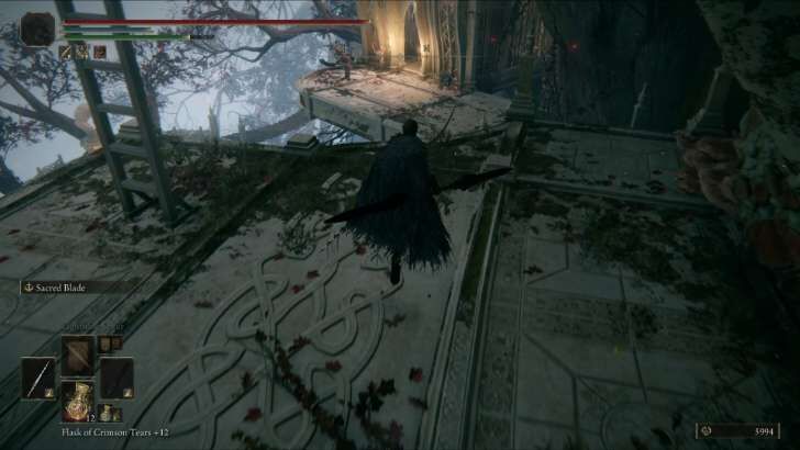 Follow the path north to the building