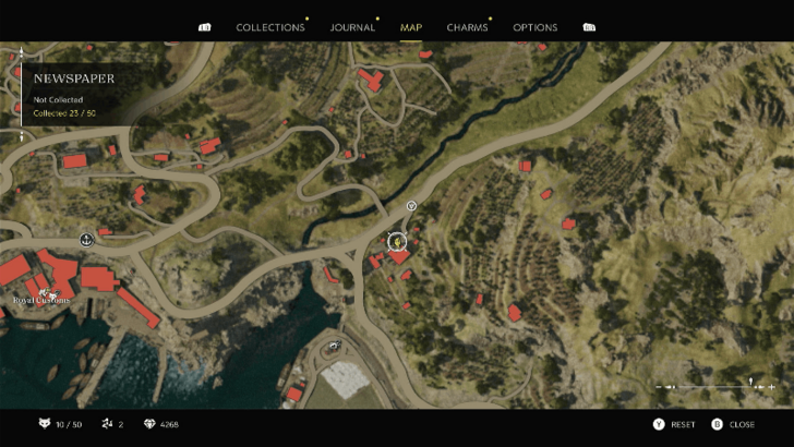 Diver Sets Record The newspaper is on top of the stairs of the pink house east of Porto Almaro. Map Location