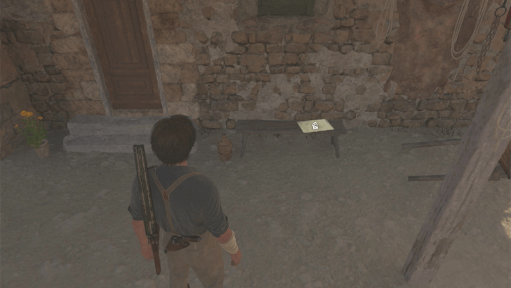 Peak Conquered The newspaper is found on a wooden bench behind the house northwest of Pasquale