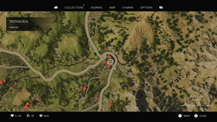 Trinacria 26 Found hanging on a wall of a house with a green door southwest of Villa Torrisi. Map Location