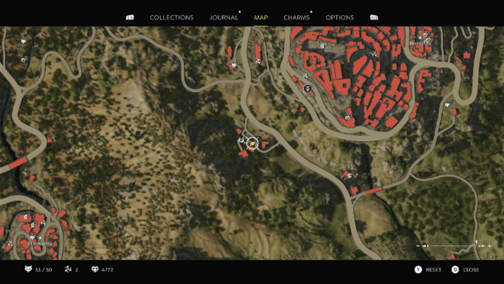 Mystery Fox 35 On top of the stone bench beside the table at the yellow house southwest of San Celeste. Map Location