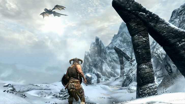 dragonborn looking up at a wyvern skyrim