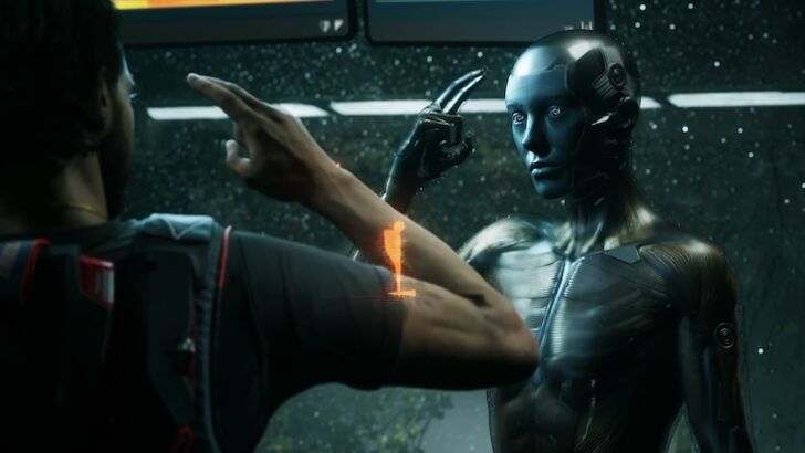 Jacob Diaz talking to a robotic character