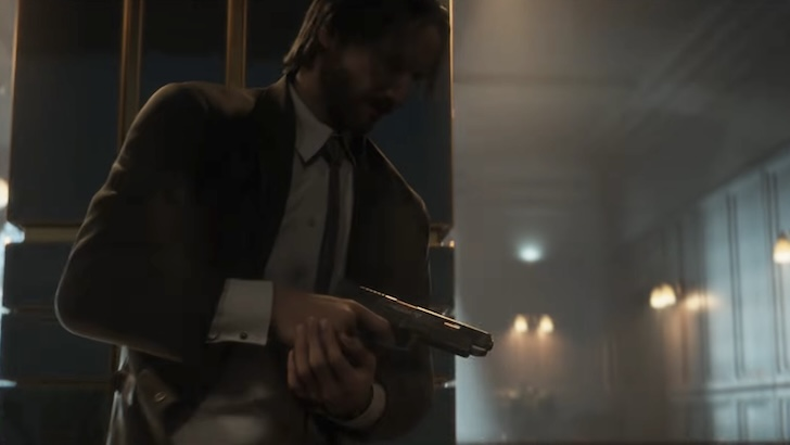 John Wick taking cover while holding a gun