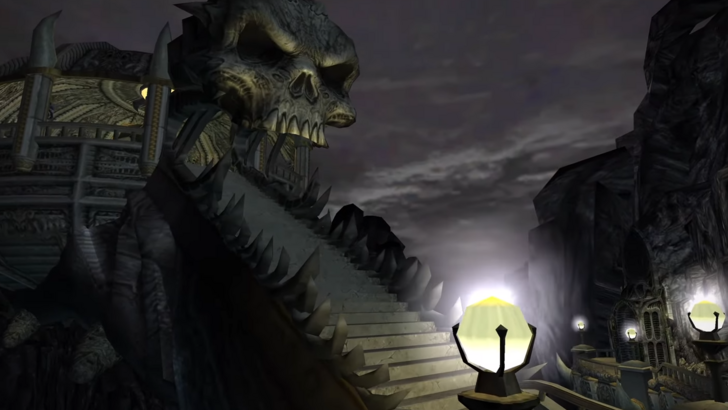 A skull-shaped entrance to a fortress, staircase adorned with jaws and a grey sky