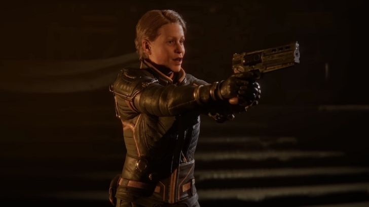 Sheridan Bouchard pointing a gun to her left