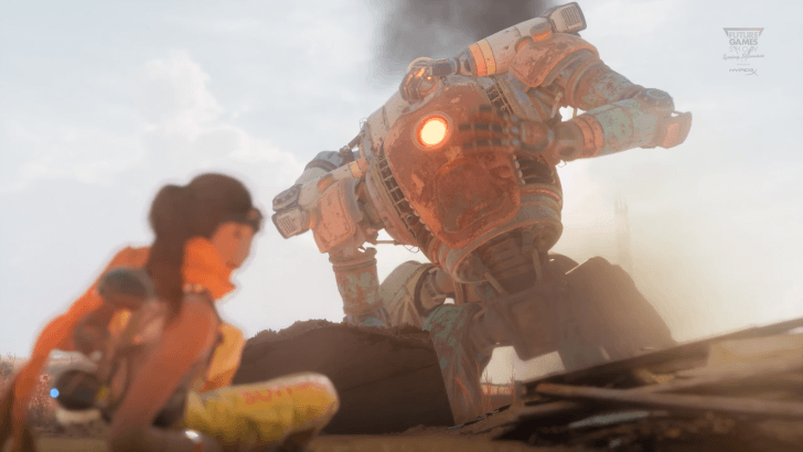 A young woman sits in the shadow of a giant robot