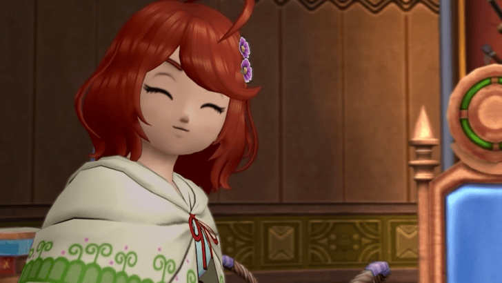 Porte smiling with her eyes closed