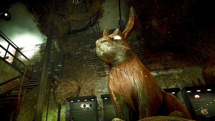 A large wooden rabbit with glowing eyes
