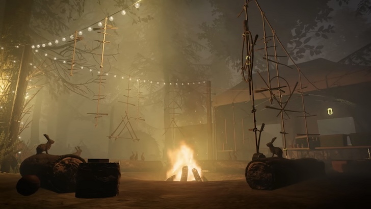 Campfire surrounded by hanging ritual symbols