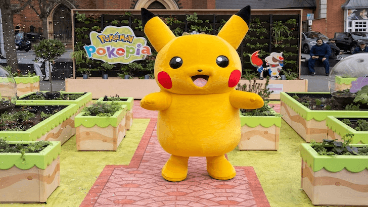 Pikachu mascot at Pokopia Garden in London
