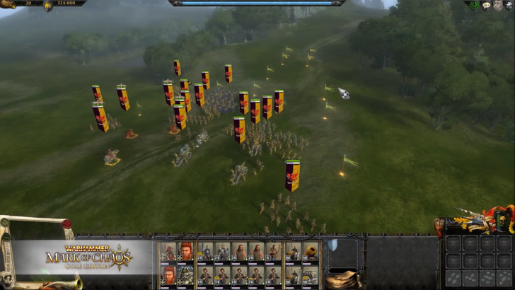 Warhammer Classics Mark of Chaos gameplay, army charging ahead through a field, with cannons launching in the air
