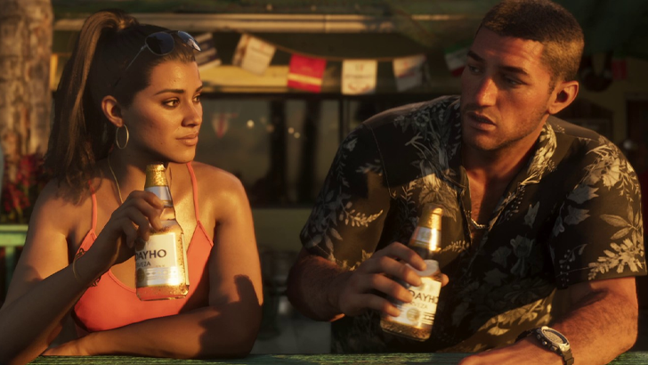 Lucia and Jason holding beer bottles