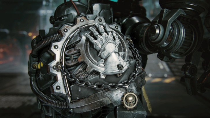 Warhammer 40,000: Space Marine Iron Hands armor with a mechanical hand emblem