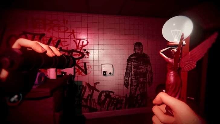 Graffiti on a bathroom wall