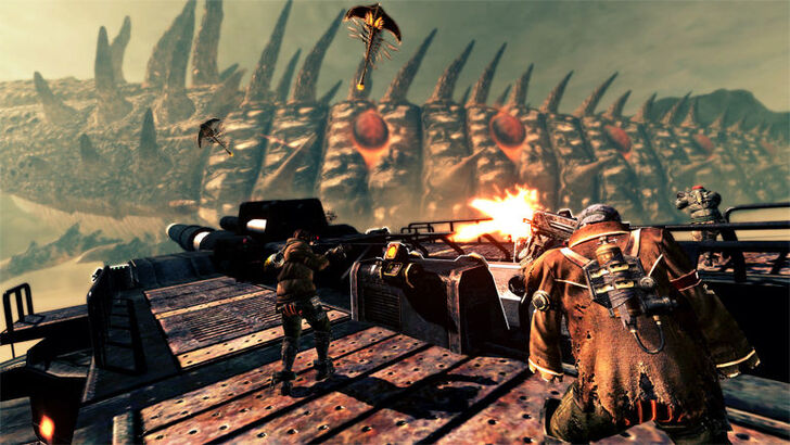 Lost Planet 2 Soldiers firing from a platform at massive Akrid