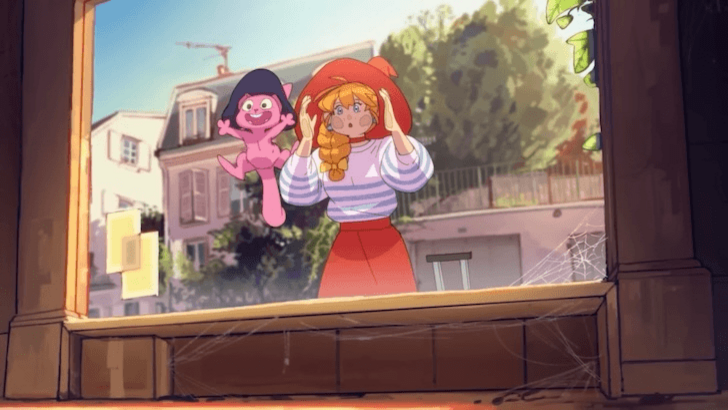 witch and pink cat pressed against glass looking into store