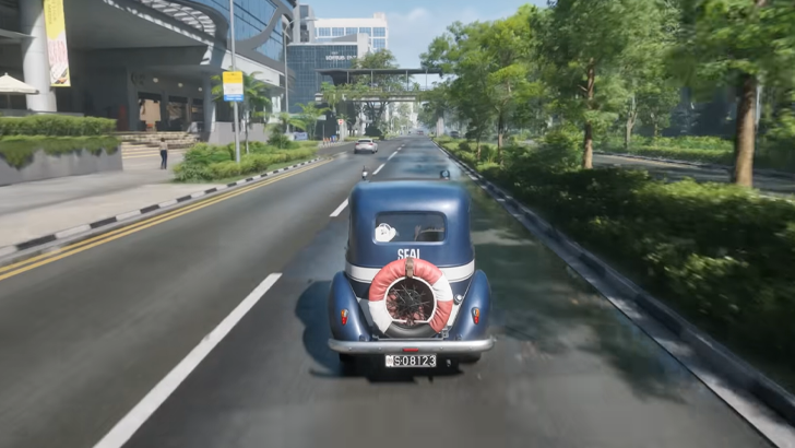 blue volkswagen type car driving through city with SEAL logo and red and white tire in the back
