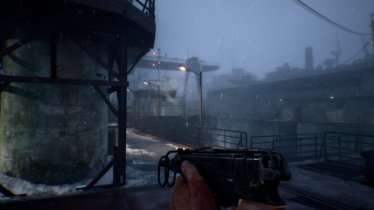 first person pov holding gun looking out at snowy sky and metal structures