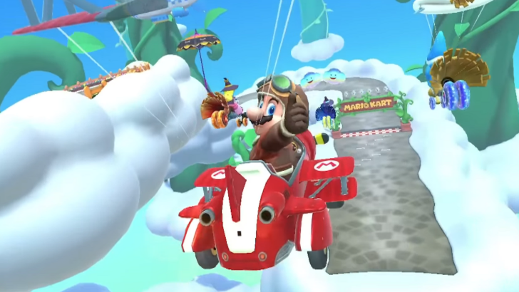 mario kart tour mario thumbs up while flying