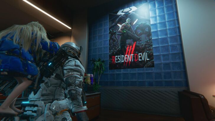 Hugh and Diana Looking At Resident Devil Poster