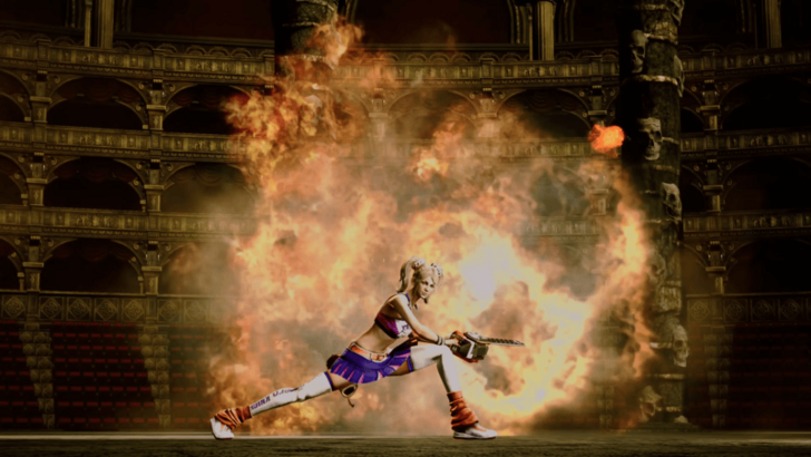 Chainsaw wielding cheerleader poses in front of an explosion