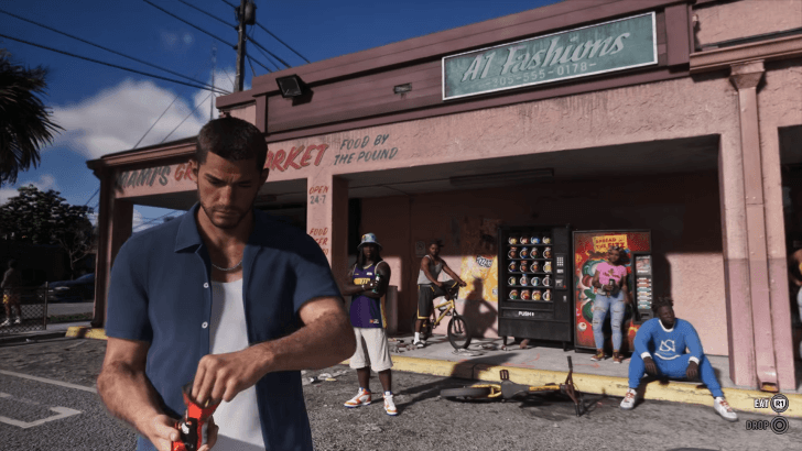 Jason opening soda can in front of a store